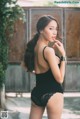 Beautiful Pichana Yoosuk shows off her figure in a black swimsuit (19 photos) P1 No.b4a7a7