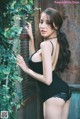 Beautiful Pichana Yoosuk shows off her figure in a black swimsuit (19 photos) P14 No.49668b