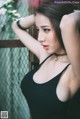Beautiful Pichana Yoosuk shows off her figure in a black swimsuit (19 photos)